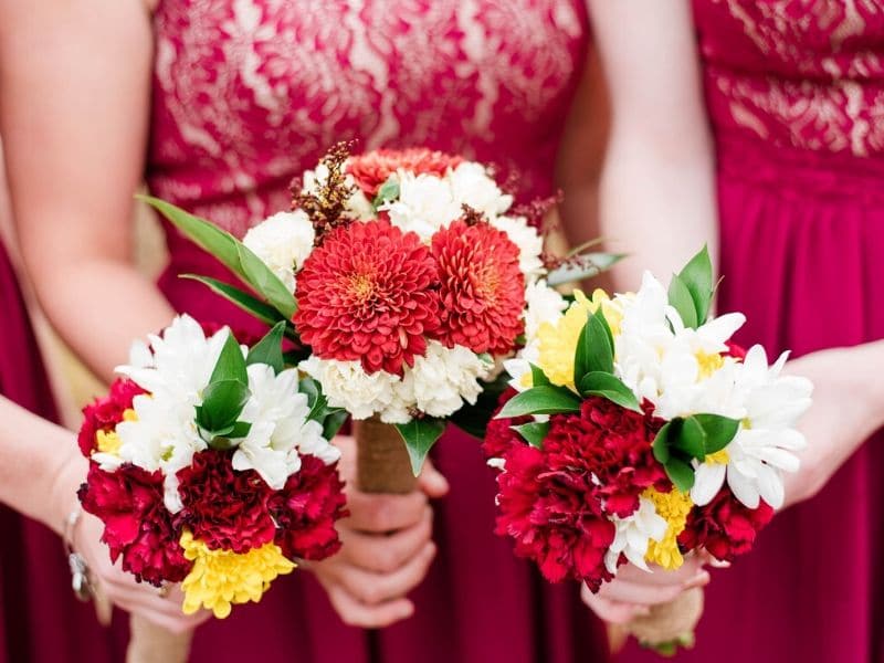 bridesmaids holding bouquet